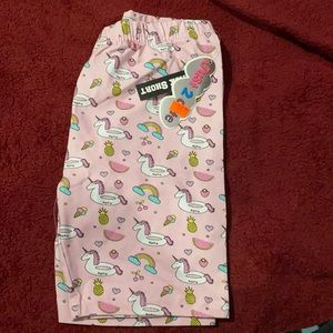 Biker shorts in pink with unicorn on them
